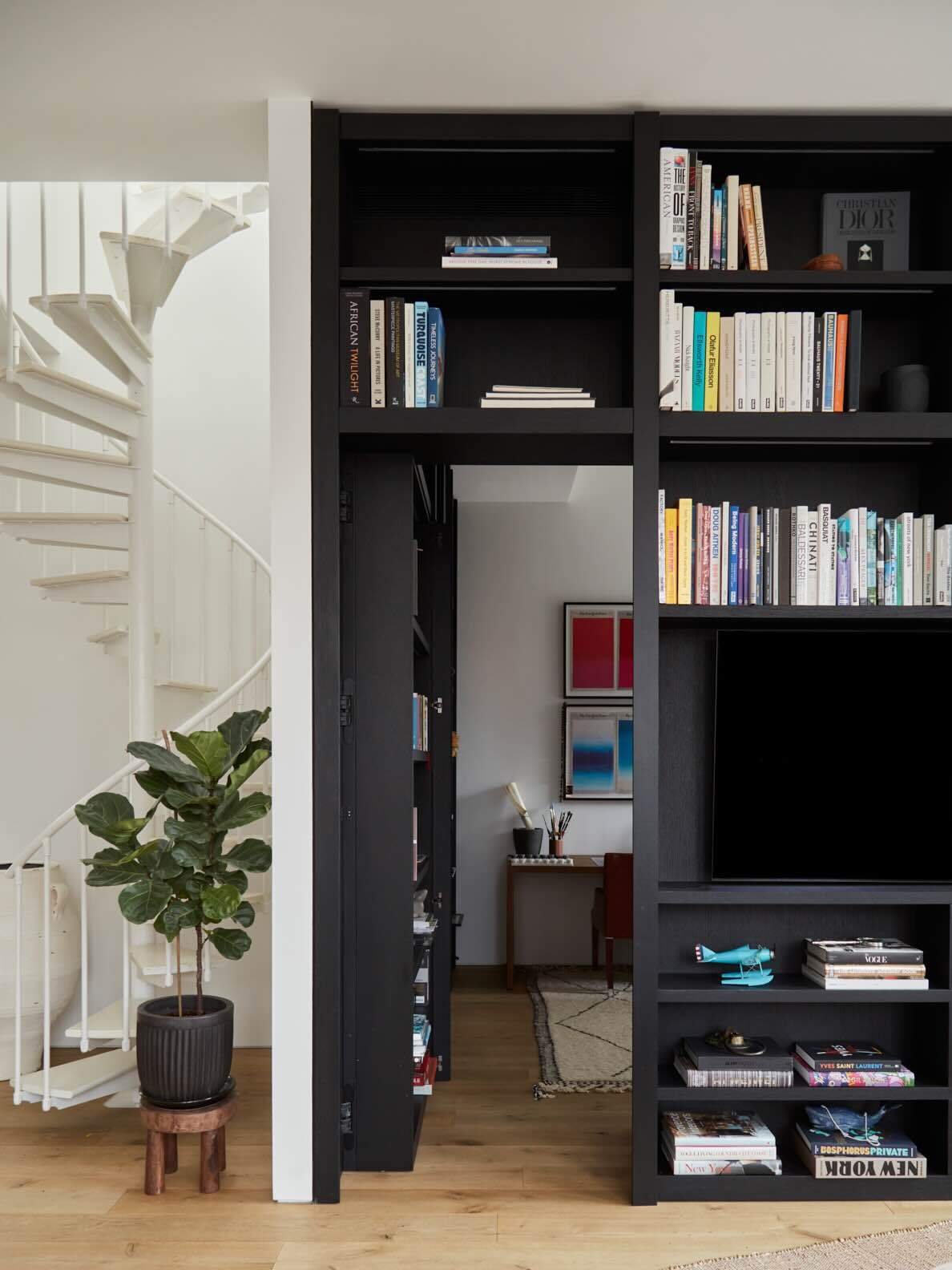 Custom bookcase door and built-ins made in Italy